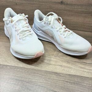 Nike Women’s White Running Sneakers with Soft Pink Accents